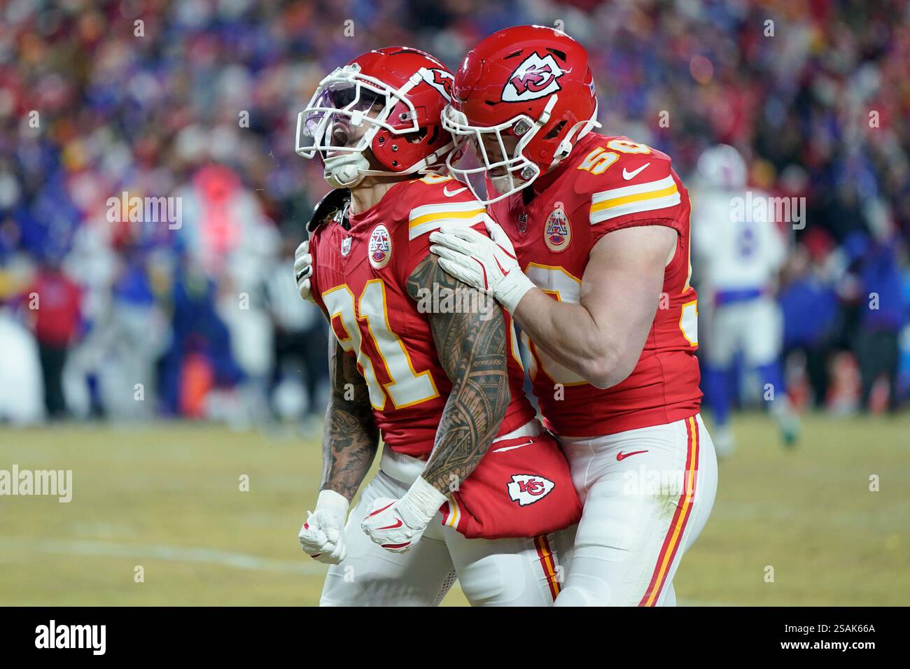 Kansas City Chiefs Wide Receiver Nikko Remigio 81 Celebrates A Punt Kansas City Chiefs Wide Receiver Nikko Remigio 81 Celebrates A Punt Return With Kansas City Chiefs Linebacker Swayze Bozeman 50 During An Afc Nfl Football Game Against The Buffalo Bills Sunday Jan 26 2025 In Kansas City Mo Ap Photoed Zurga 2SAK66A