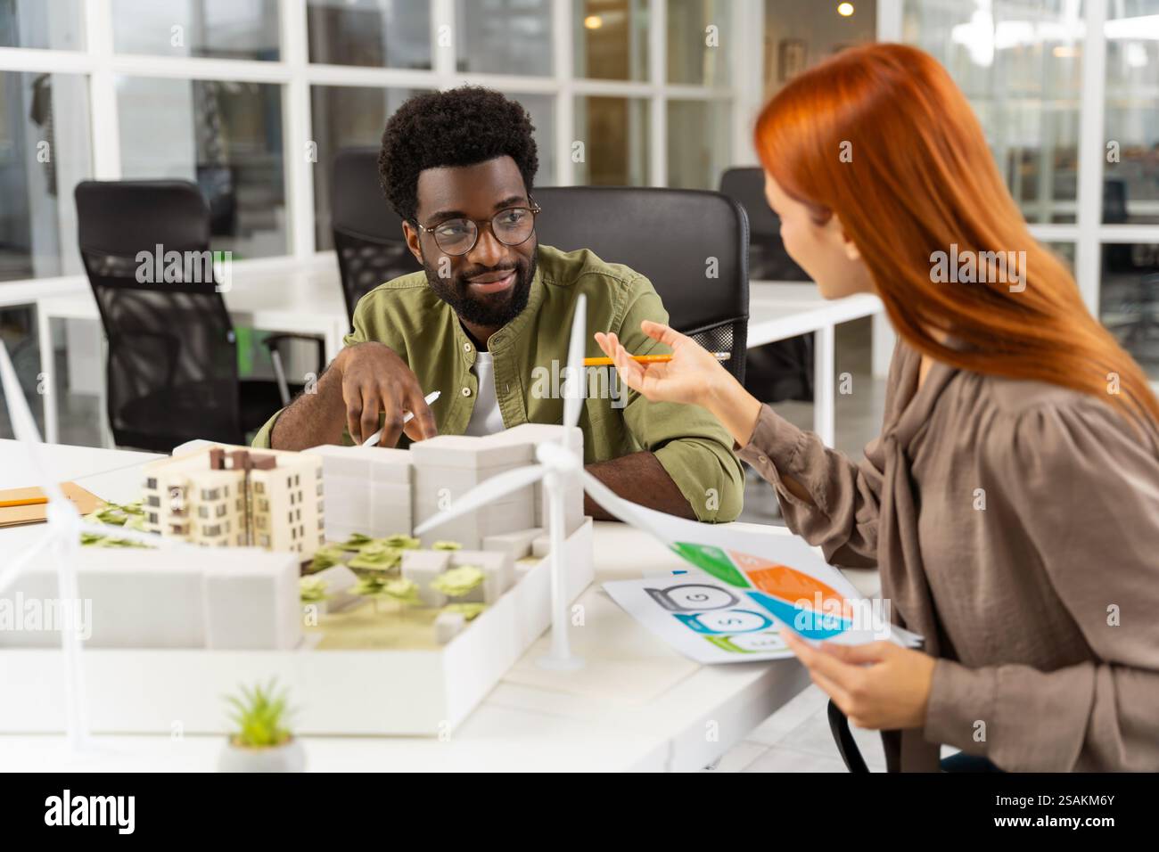 Two young architects working together on a new sustainable project Stock Photo
