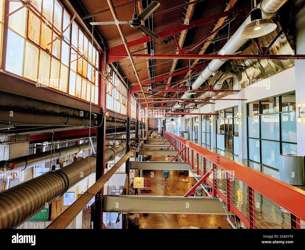 Industrial Office Transformation with Natural Light Corridor View Stock ...