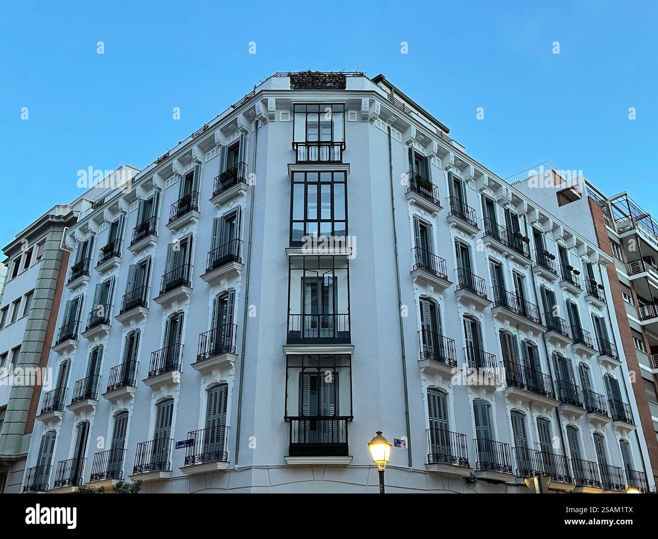 Facade of building, night view. Lagasca street, Madrid, Spain. - Smartphone Captured Stock Image