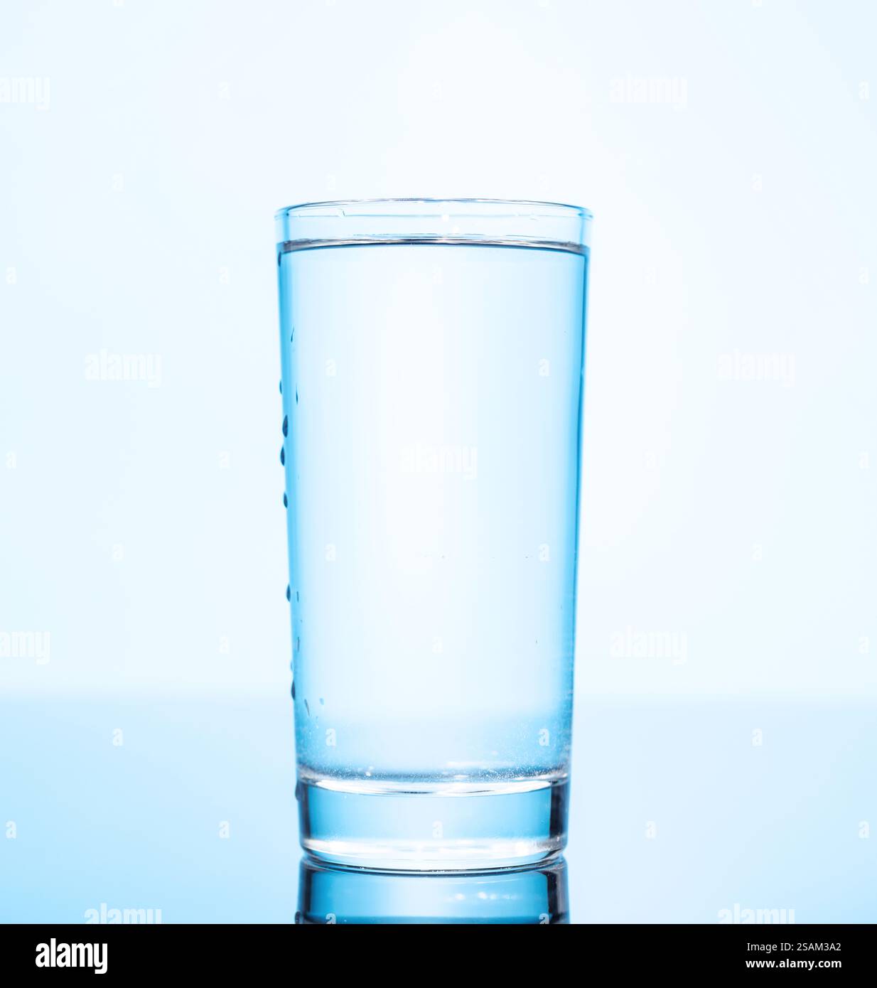 A simple and clear glass of pure water, showcasing freshness and ...