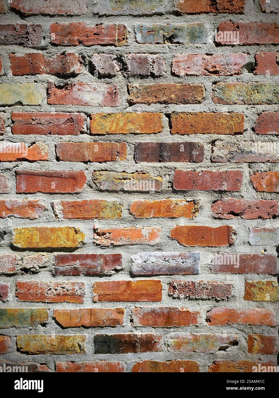 Rustic Brick Wall Texture in Daylight Eye-Level Perspective Stock Photo