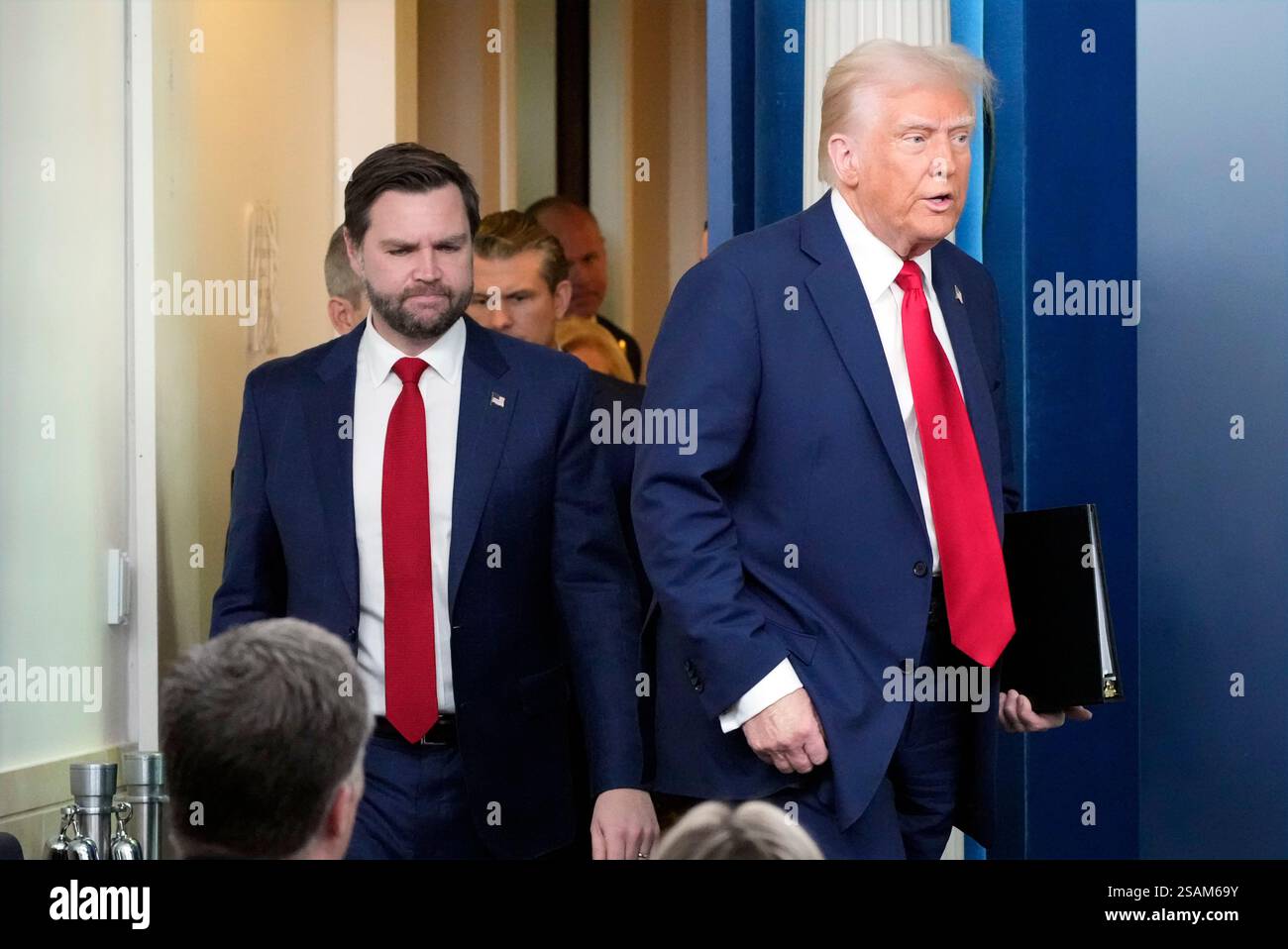 President Donald Trump, followed by Vice President JD Vance, arrives to ...