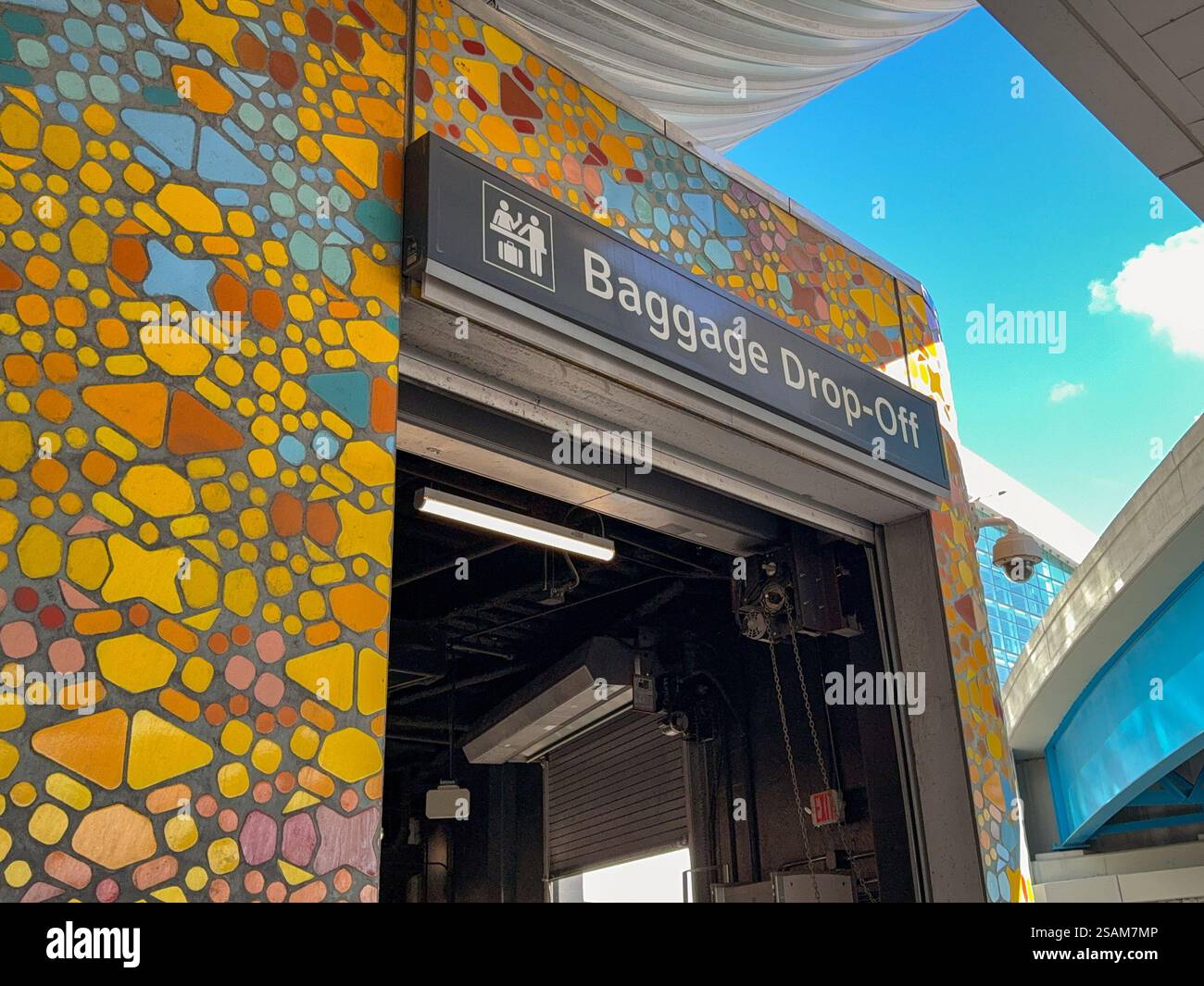 Miami, Florida, USA - 4 January 2025: Entrance to the baggage drop-off point at the cruise terminal for the Norwegian Cruise Line in the Port of Miami - Smartphone Captured Stock Image