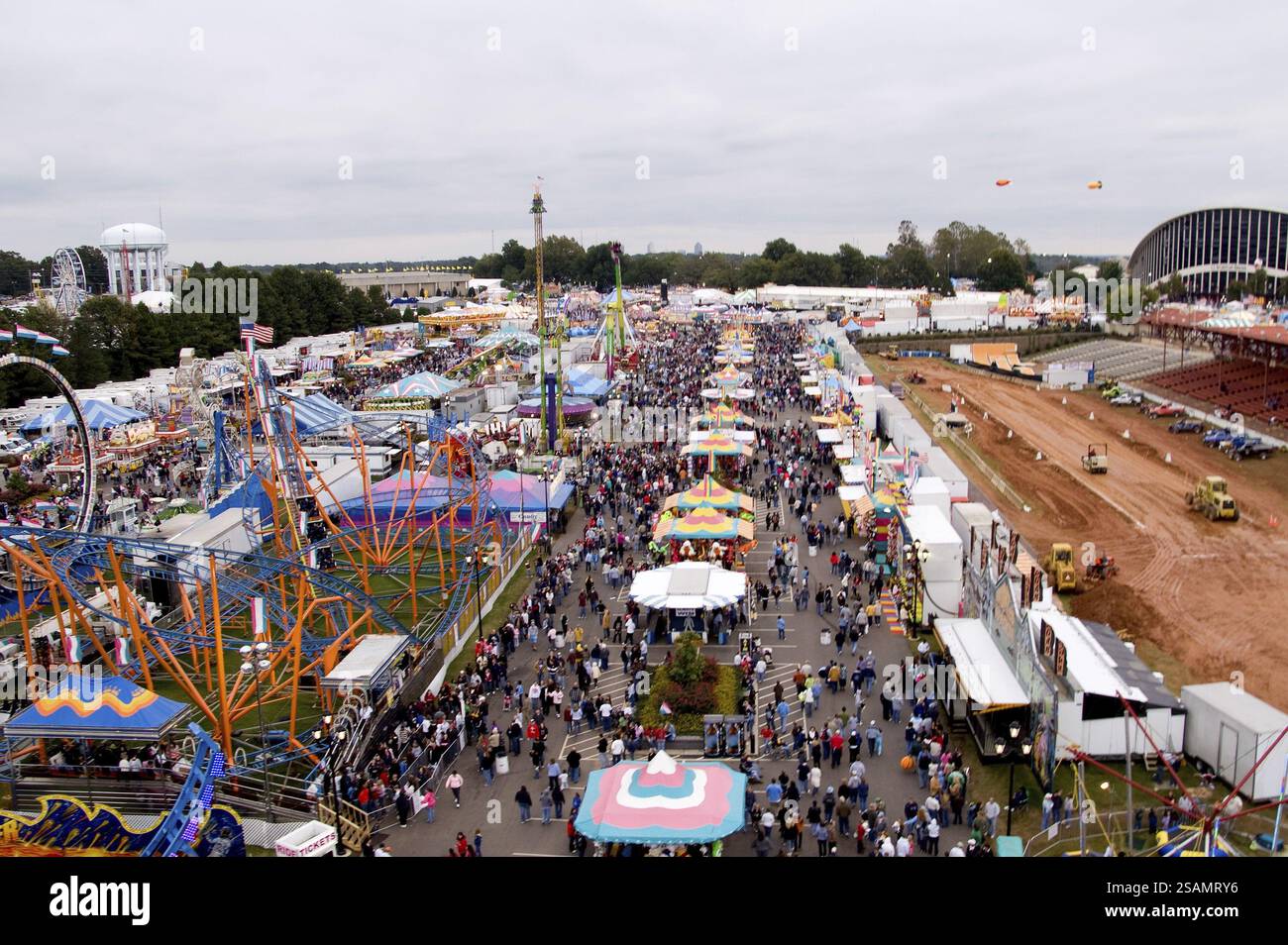 Random Fair Photos The midway at a State Fair carnival Stock Photo - Alamy