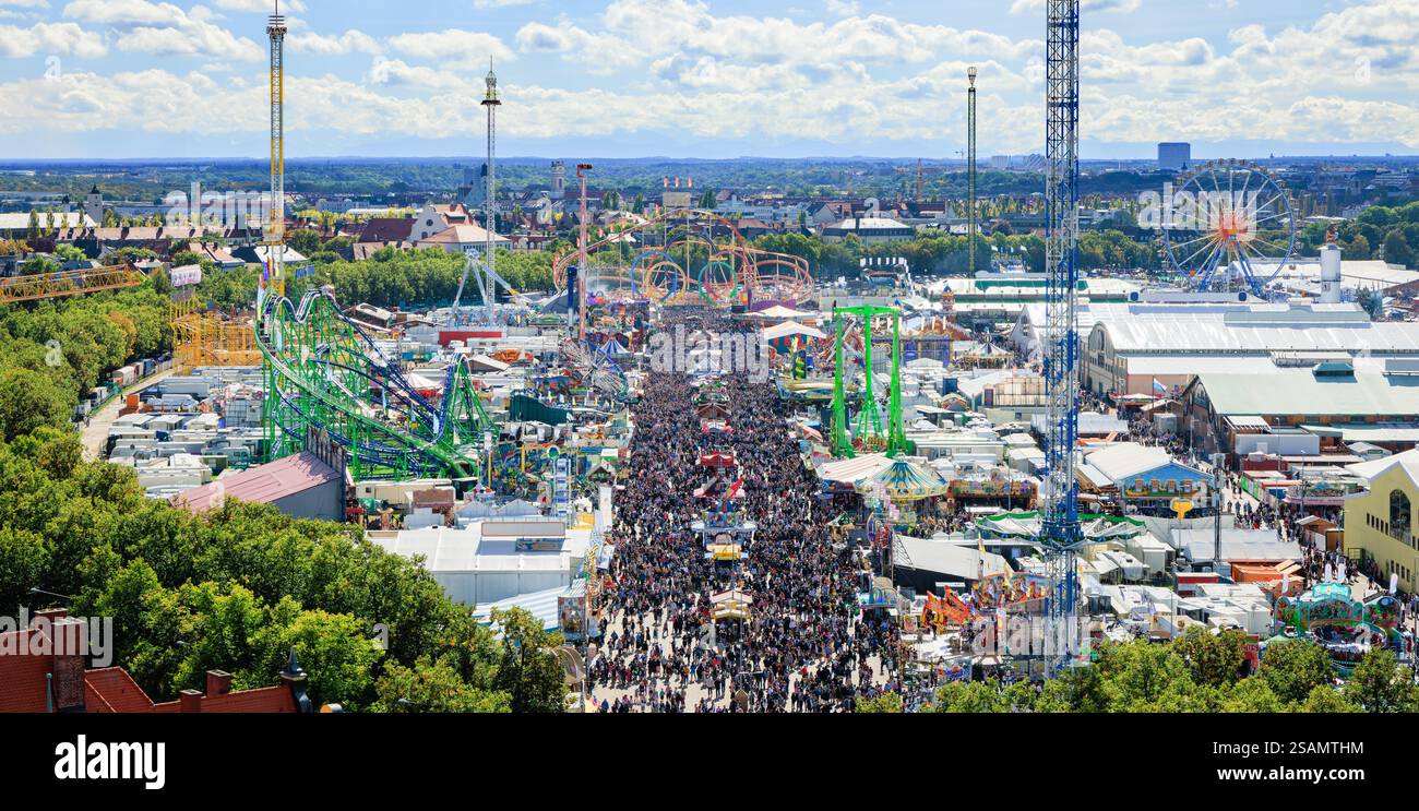 Aerial view of the Munich Oktoberfest with crowds, rides and marquees ...