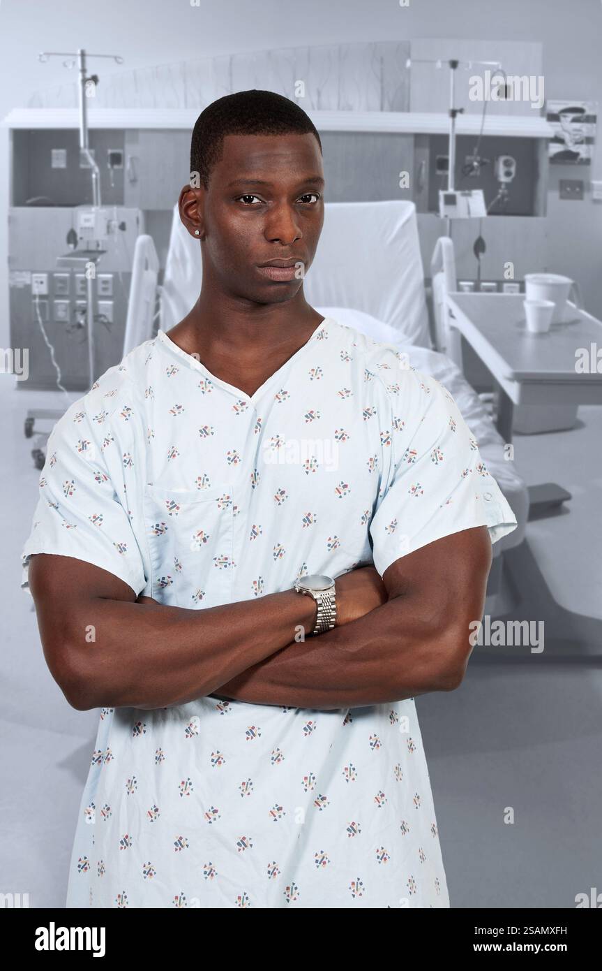 Black African American man patient in a hospital gown Stock Photo - Alamy