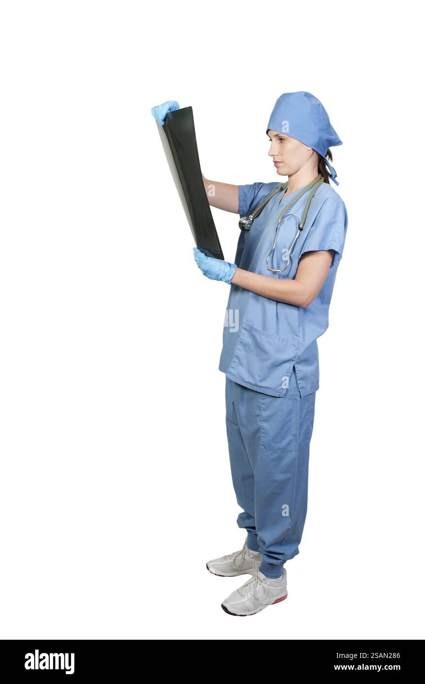 A beautiful female radiologist examining an x-ray Stock Photo - Alamy