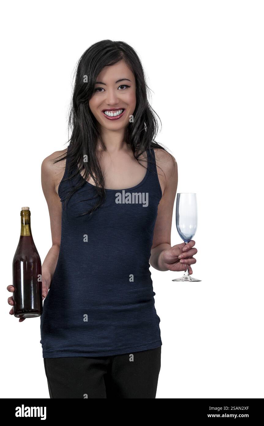 Beautiful Asian woman holding a wine bottle and glasses Stock Photo - Alamy
