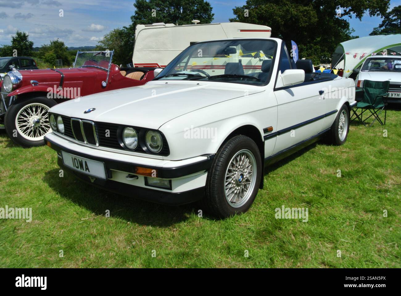 A 1990 BMW E30 convertible parked on display at the 49th Historic ...