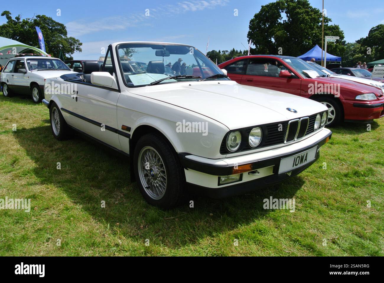 A 1990 BMW E30 convertible parked on display at the 49th Historic ...