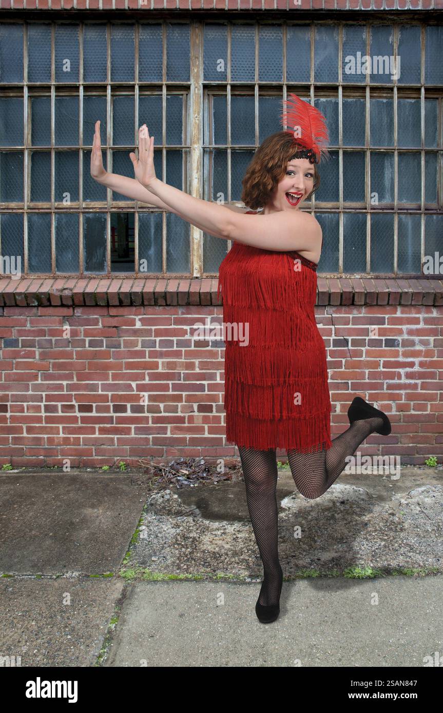Woman dressed as a 1920s flapper girl Stock Photo - Alamy
