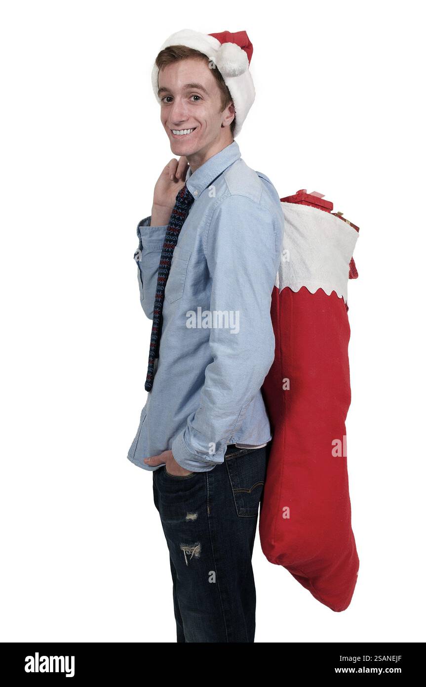 Handsome young man wearing a Santa hat Stock Photo