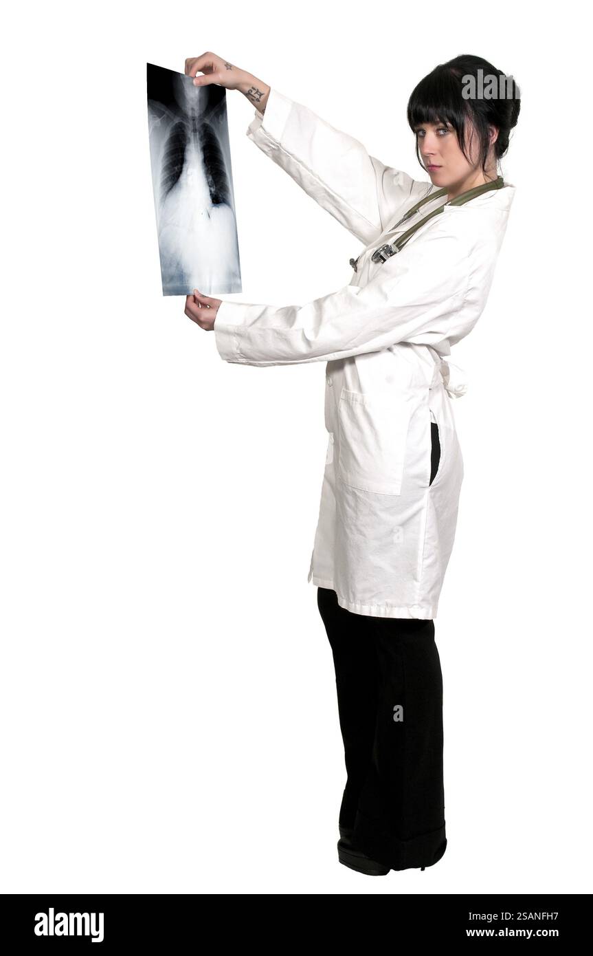 A beautiful female radiologist examining an x-ray Stock Photo - Alamy