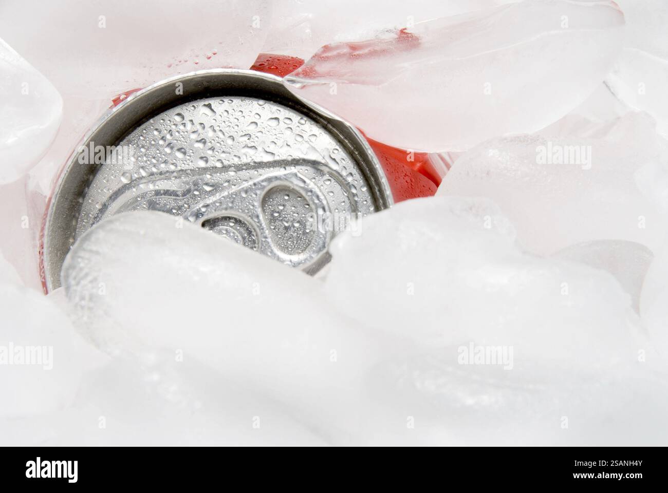 An aluminum drink can in a container of ice Stock Photo - Alamy