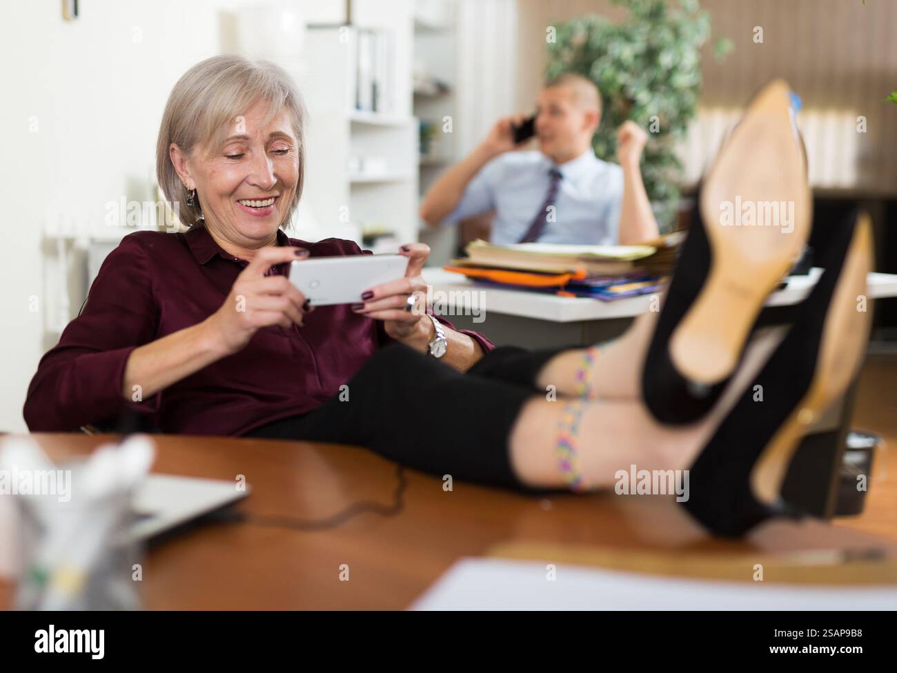 Business woman resting feet on hi-res stock photography and images - Alamy