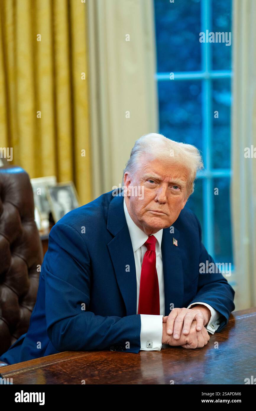 Washington, United States. 30th Jan, 2025. President Donald Trump signs ...