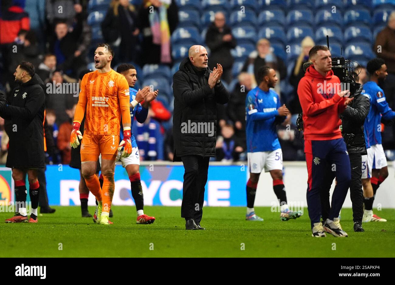 Rangers manager Philippe Clement (centre) and players applaud the fans