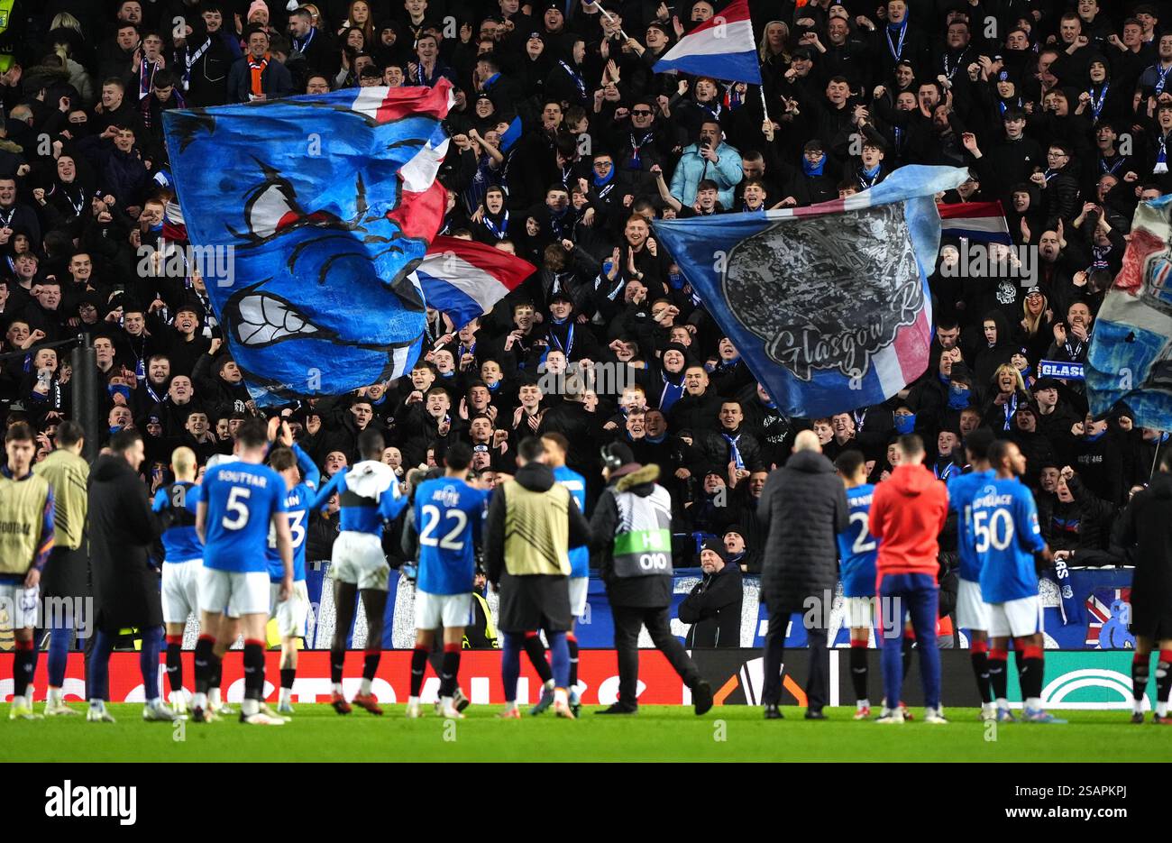 Rangers players applaud the fans after the final whistle in the UEFA