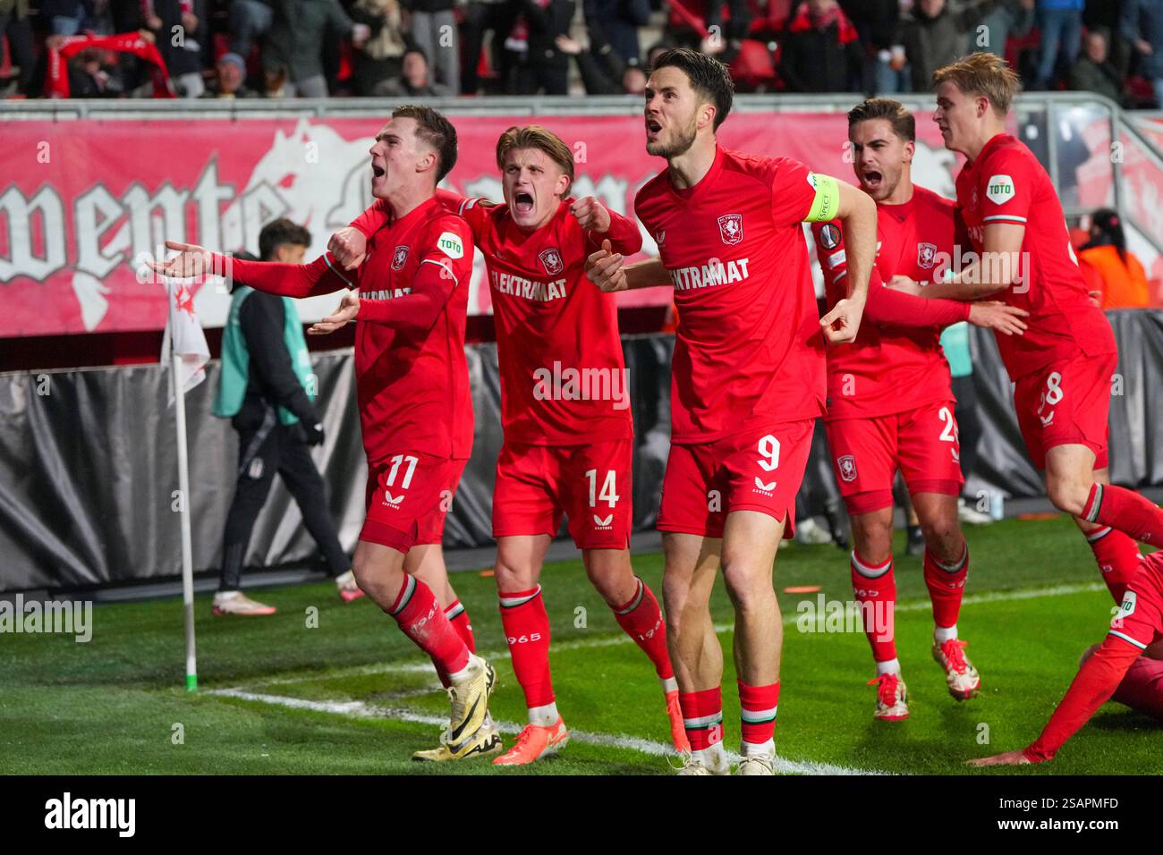 Twente's Daan Rots, left, celebrates with teammates after scoring the ...