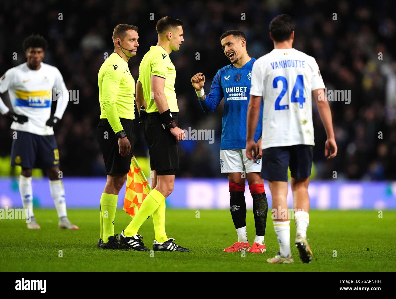 Rangers' James Tavernier speaks to referee Damian Sylwestrzak after the