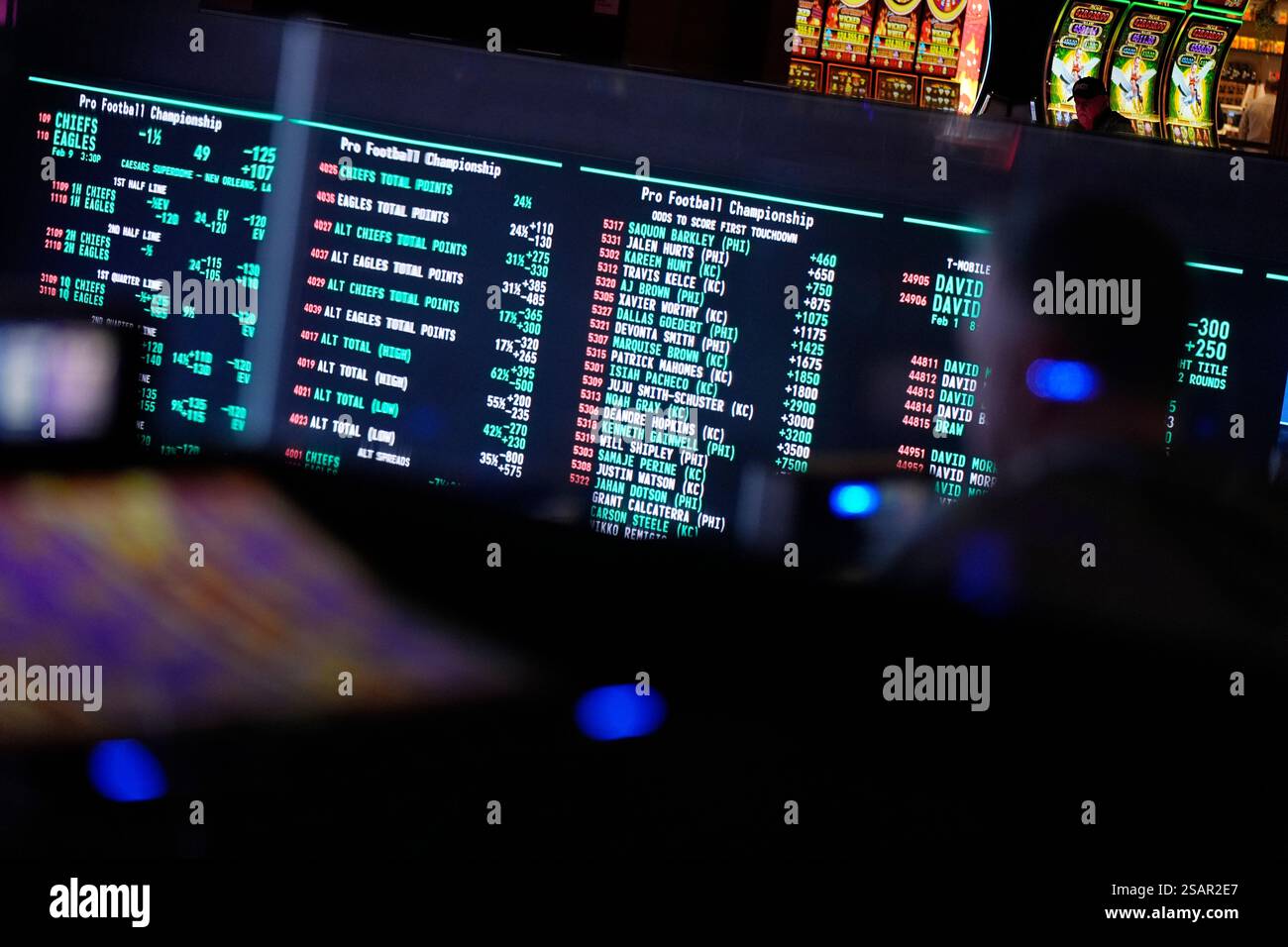 Betting odds for Super Bowl LIX are displayed on monitors at the Circa