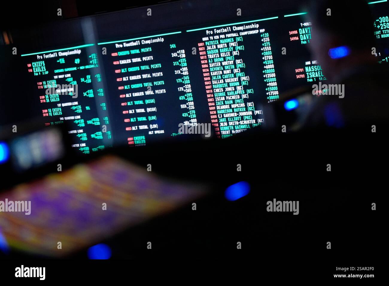 Betting odds for Super Bowl LIX are displayed on monitors at the Circa