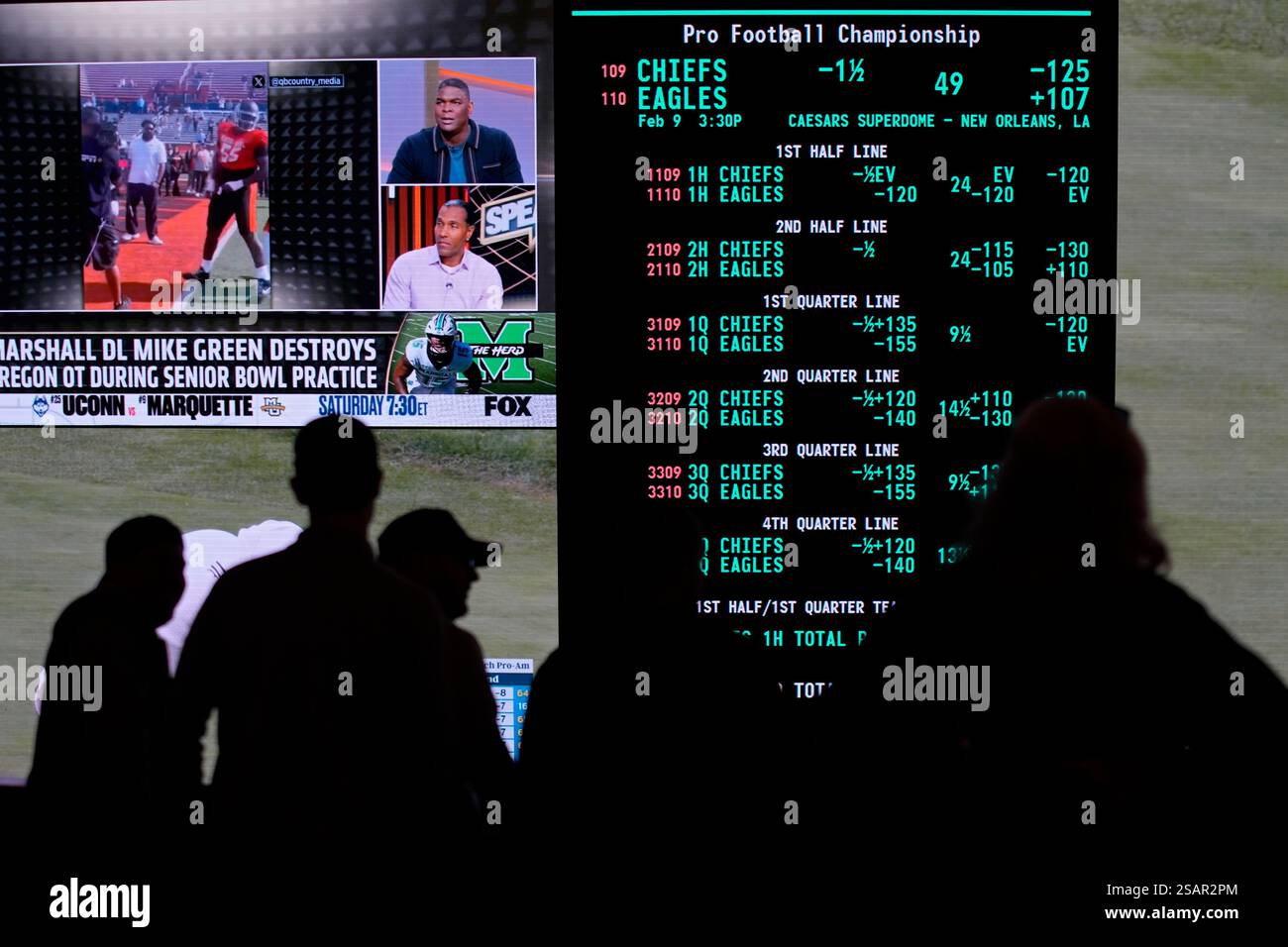 Betting odds for Super Bowl LIX are displayed on monitors at the Circa