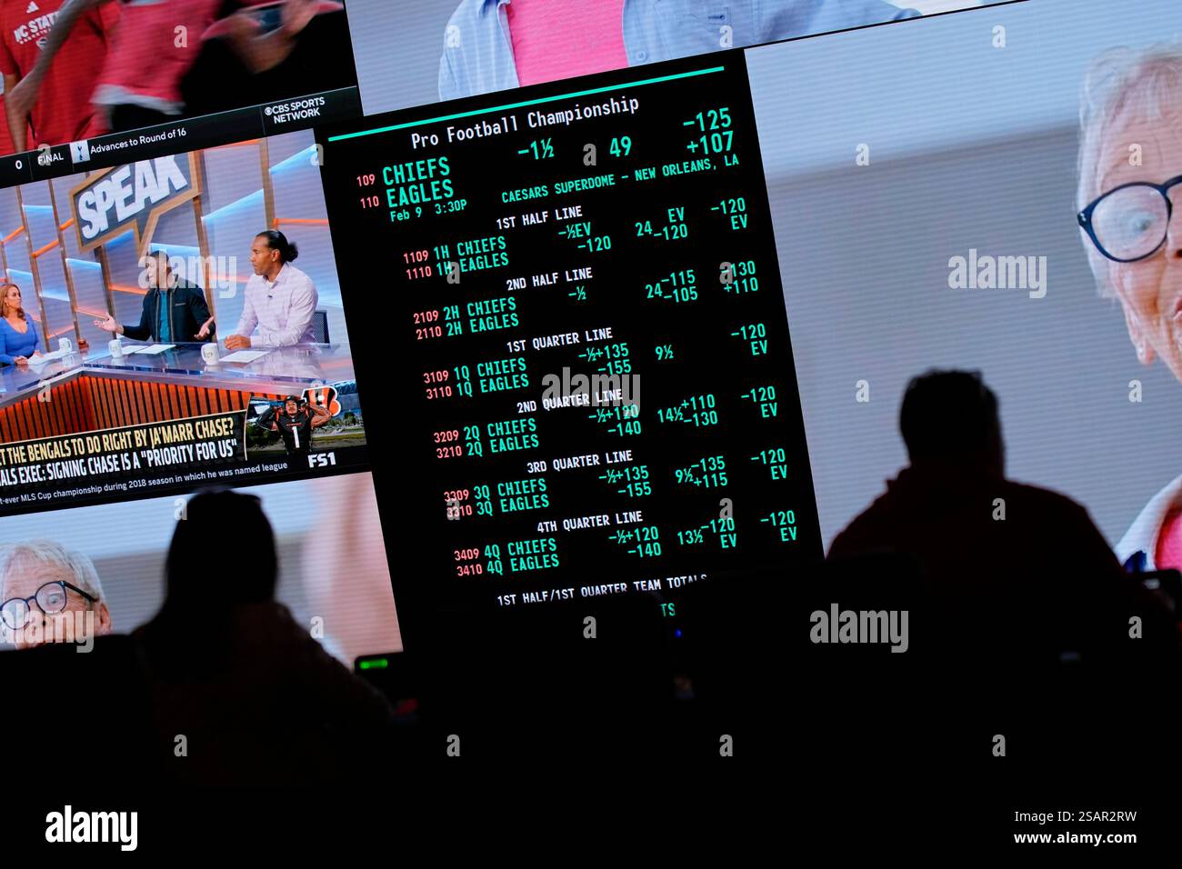 Betting odds for Super Bowl LIX are displayed on monitors at the Circa