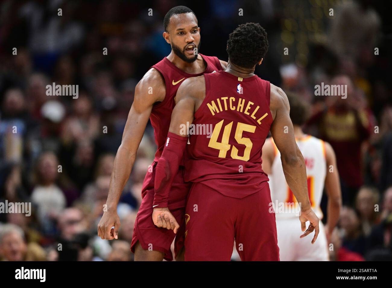 Cleveland Cavaliers forward Evan Mobley celebrates guard Donovan ...