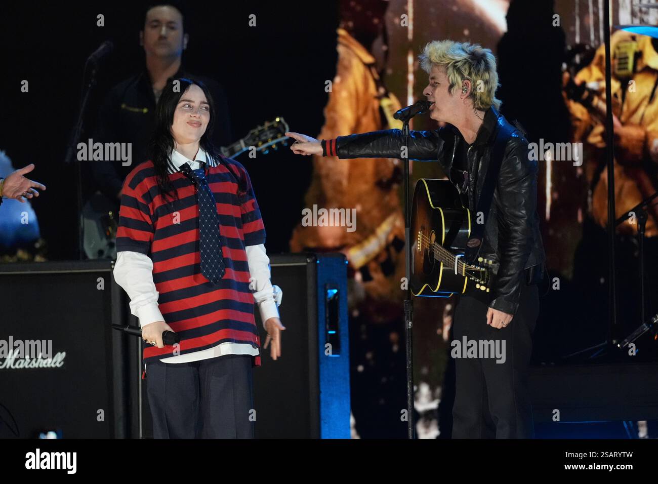 Billie Eilish, left, performs with Billie Joe Armstrong of Green Day