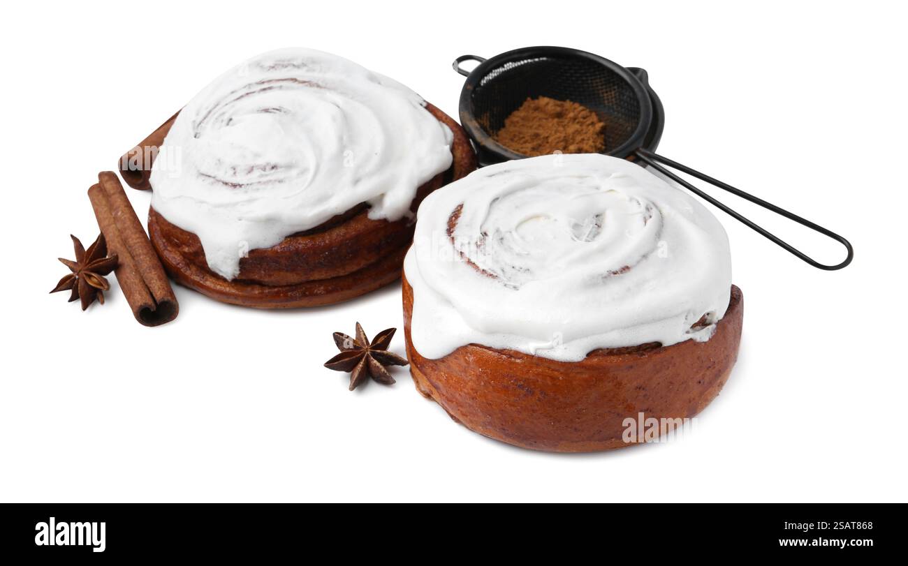 Tasty cinnamon rolls with cream and spices isolated on white Stock ...