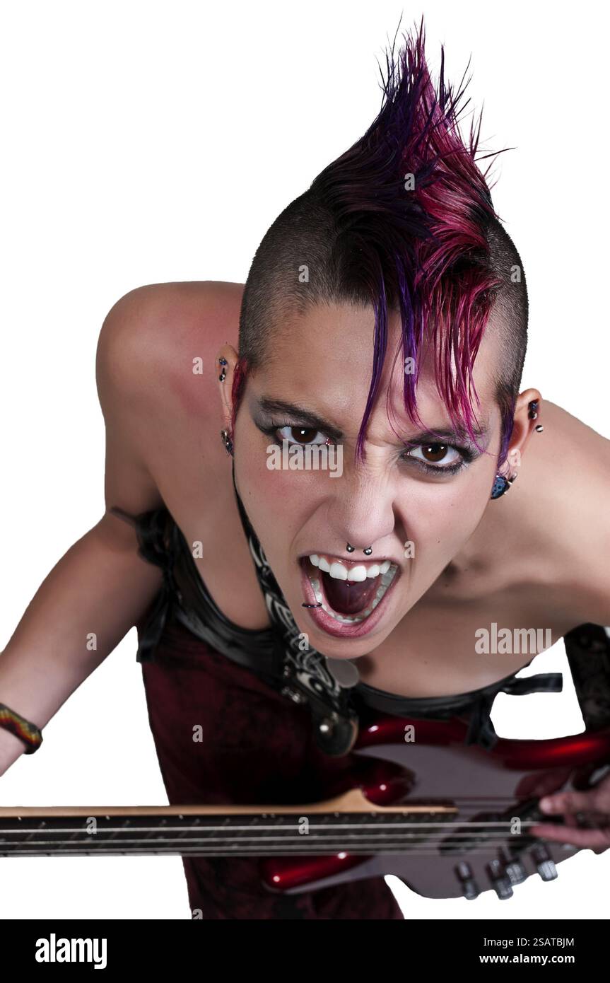 Beautiful woman punk rocker with an electric bass guitar Stock Photo ...