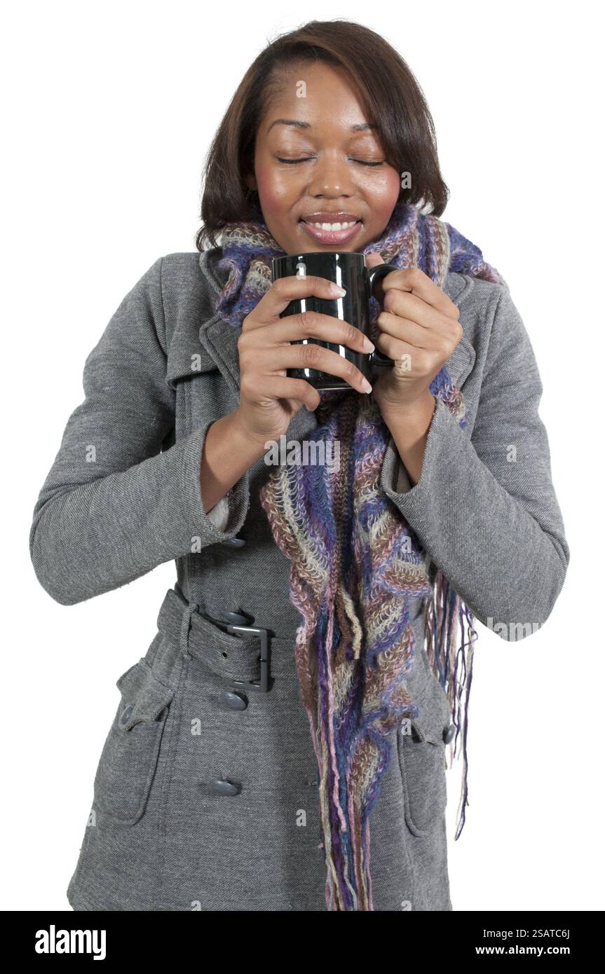 A beautiful young black woman drinking coffee Stock Photo - Alamy