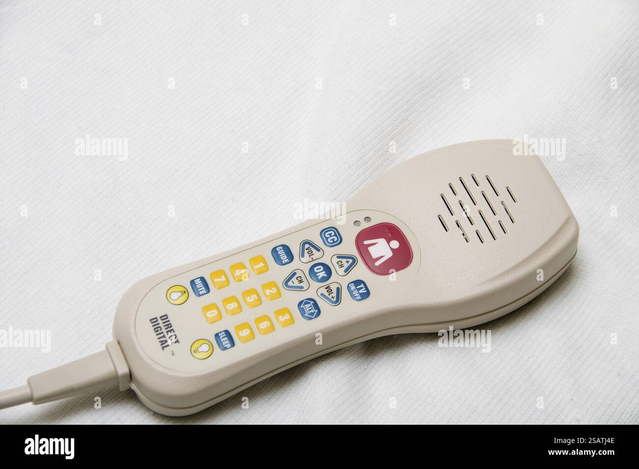 A TV remote control with a nurse call button Stock Photo - Alamy