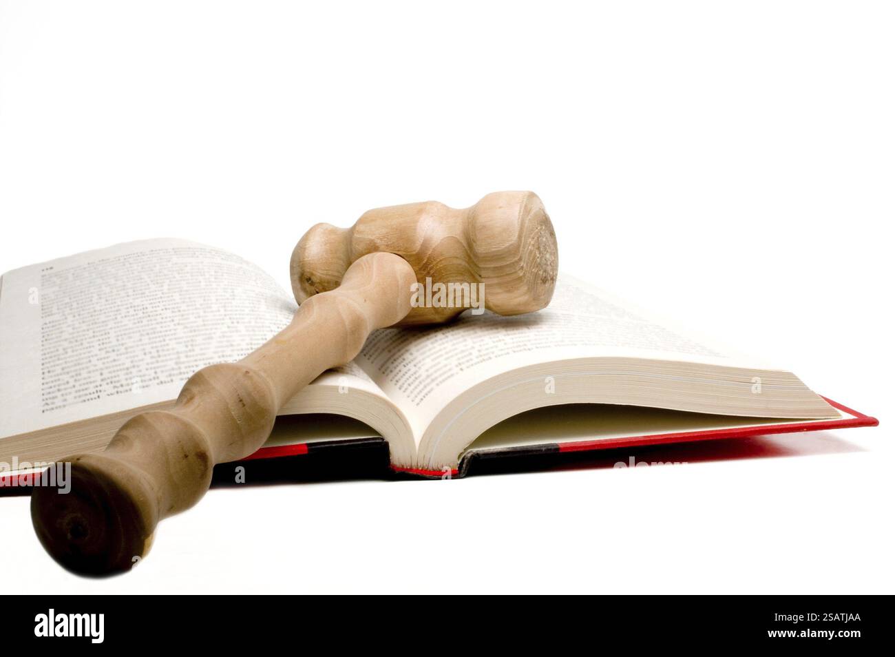 An open law book and a judges gavel Stock Photo - Alamy