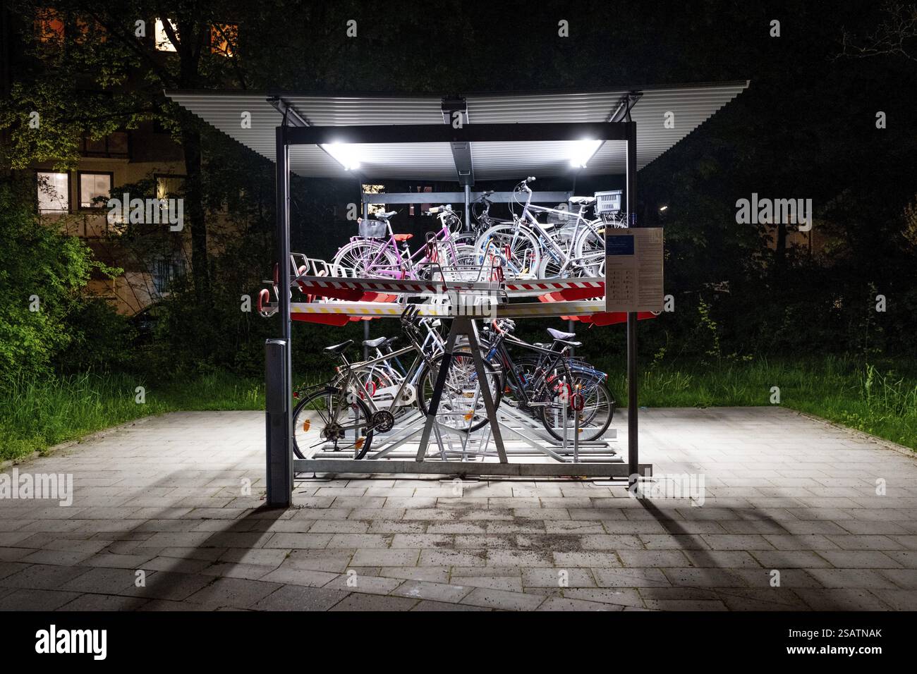 Bicycles, Modern, illuminated, two-storey bicycle racks at the Munich ...