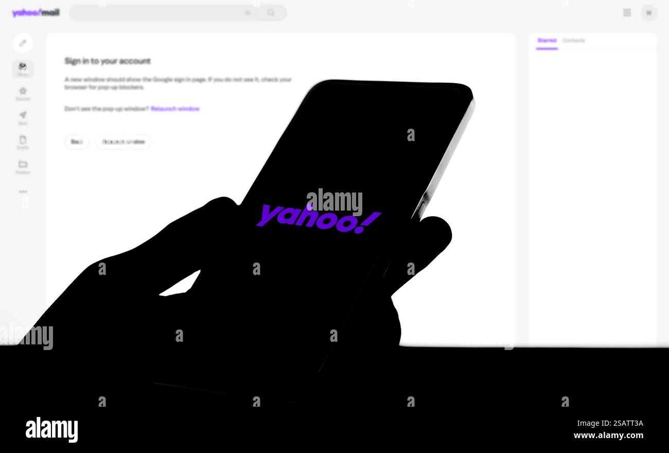 Yahoo logo on phone screen stock image Stock Photo - Alamy
