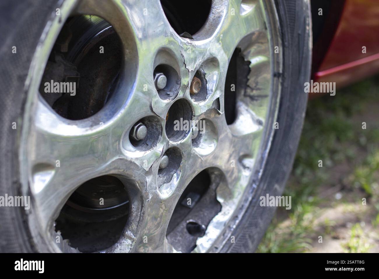 Damage to wheel rims hi-res stock photography and images - Alamy