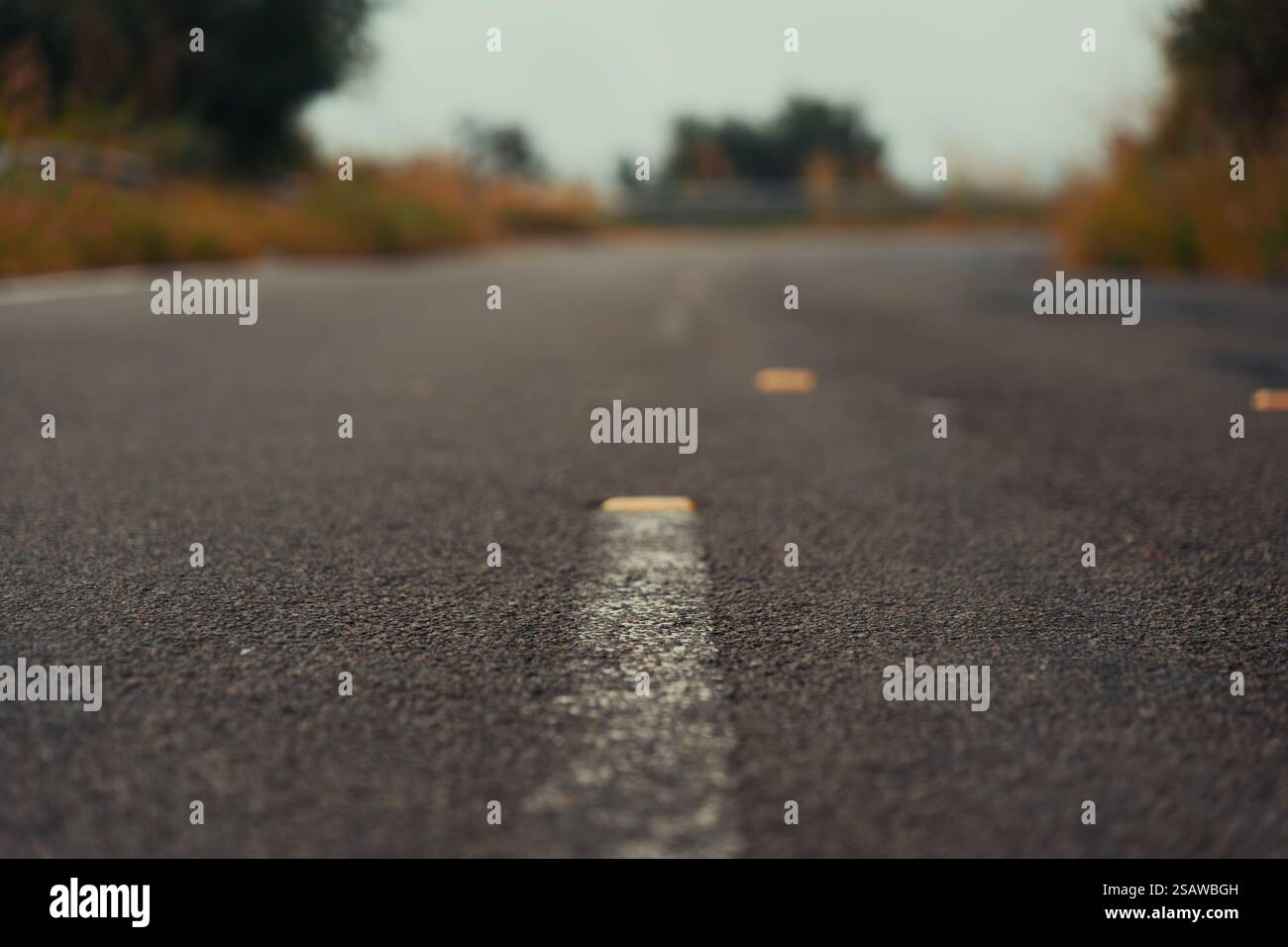 Empty asphalt road stretching hi-res stock photography and images - Alamy