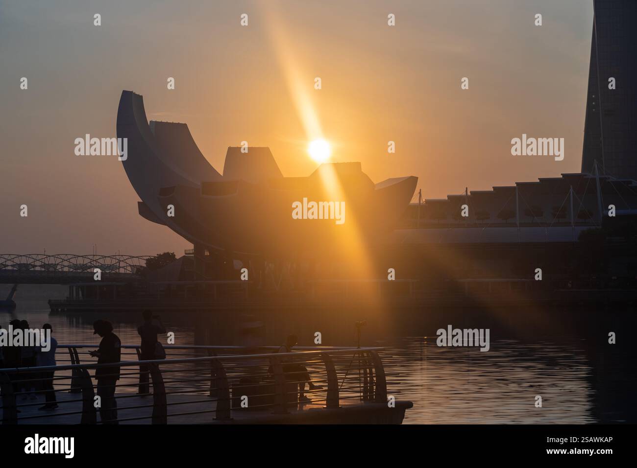 sunrise at the promenade with Marina Bay Sands hotel, the iconic ...