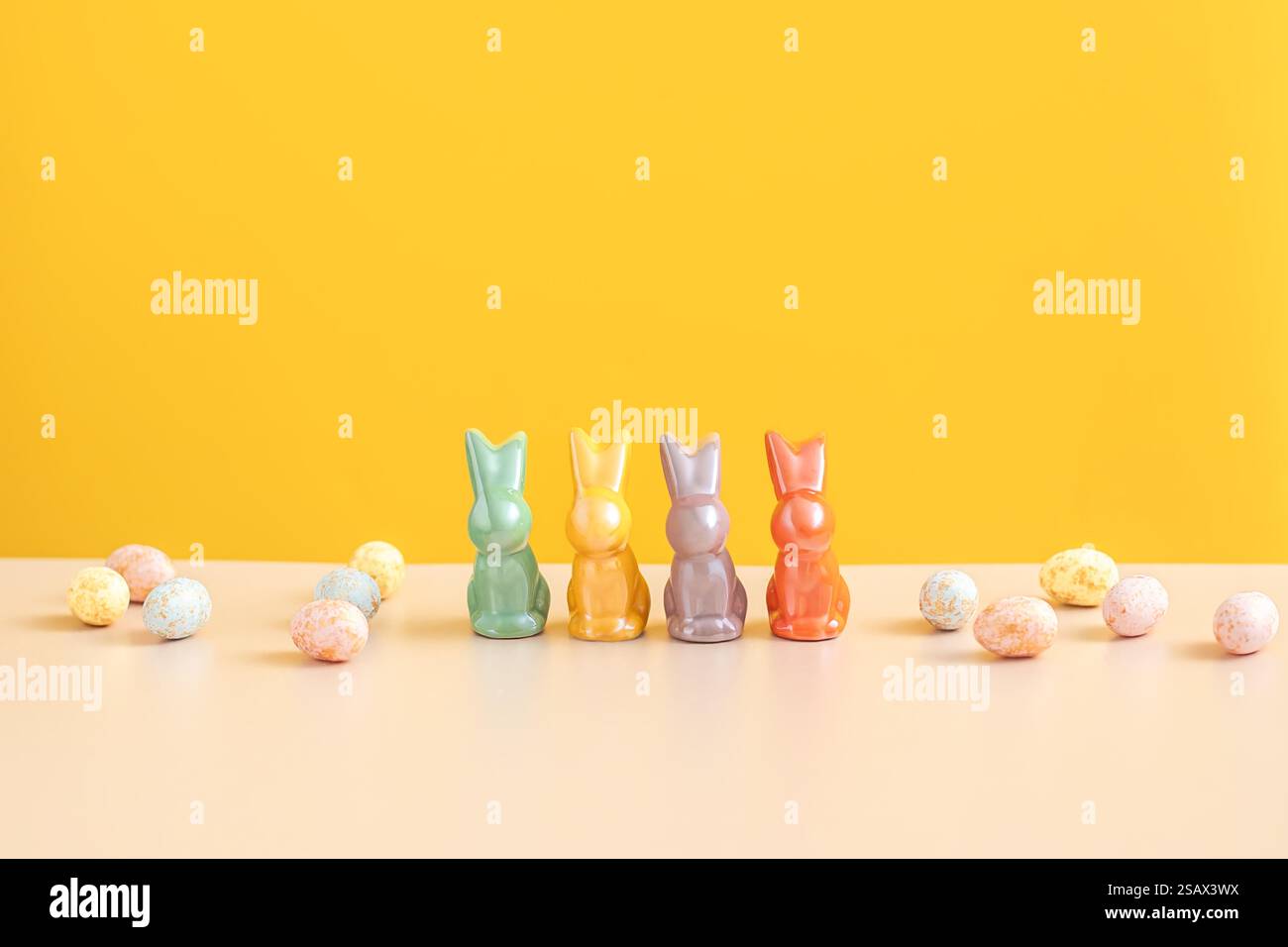 Colorful Easter Bunnies and Eggs Stock Photo