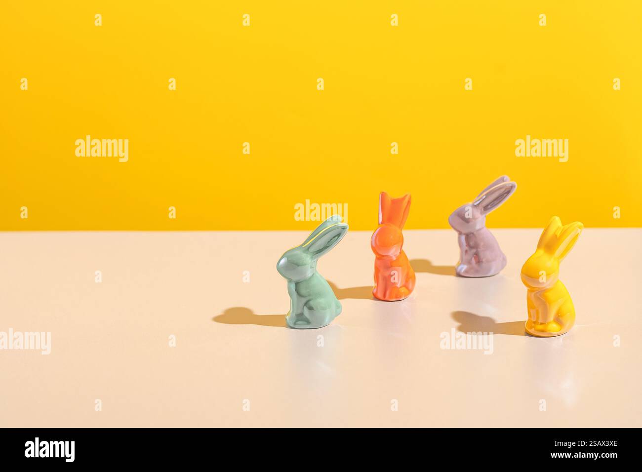 Playful Easter Rabbits on Bright Background Stock Photo