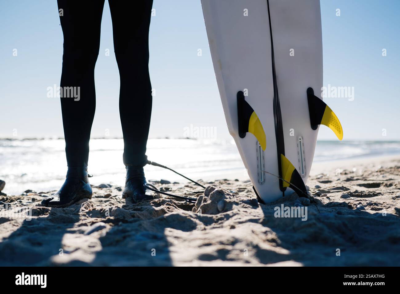 Sports guy surfer standing hi-res stock photography and images - Alamy