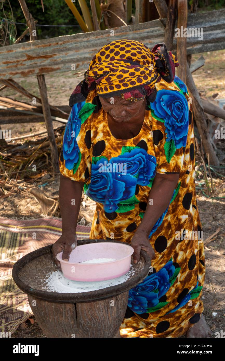 Seiving Rice Africa Tanzania, Zanzibar, East Coast, Jambiani, village cultural tour ...