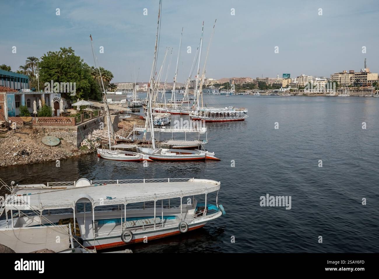 Colorful boat on the Nile river with tourists in Aswan , Egypt Stock ...