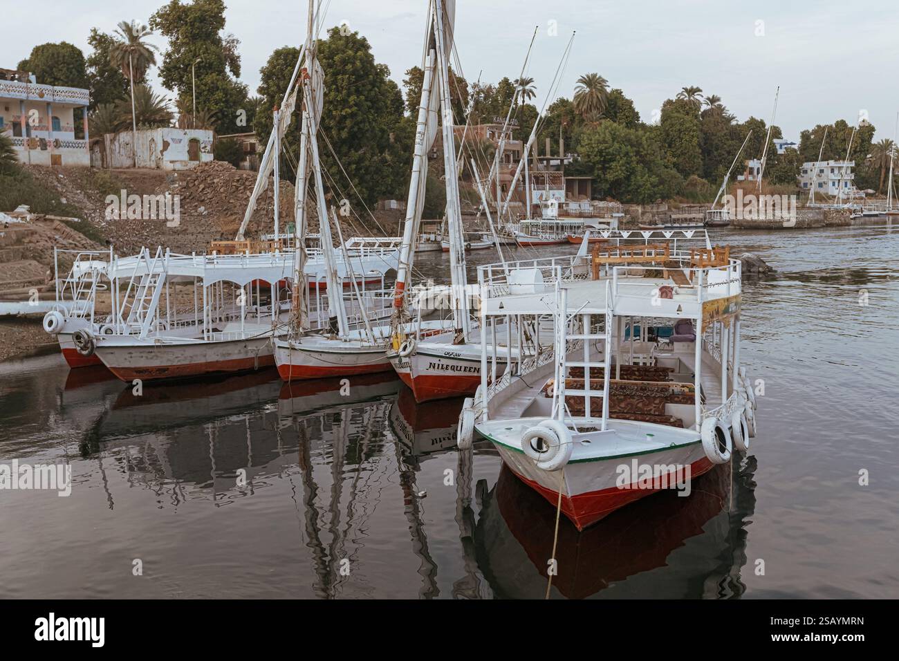 Colorful boat on the Nile river with tourists in Aswan , Egypt Stock ...