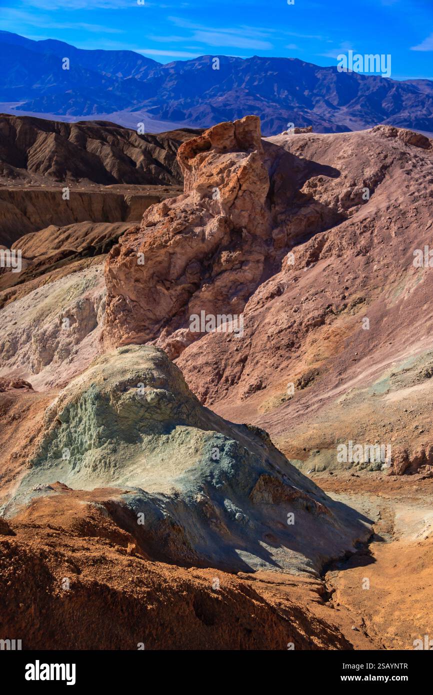 Obogon Rocks Formation Color A mountain range with a large rock formation in the middle. The rock ...