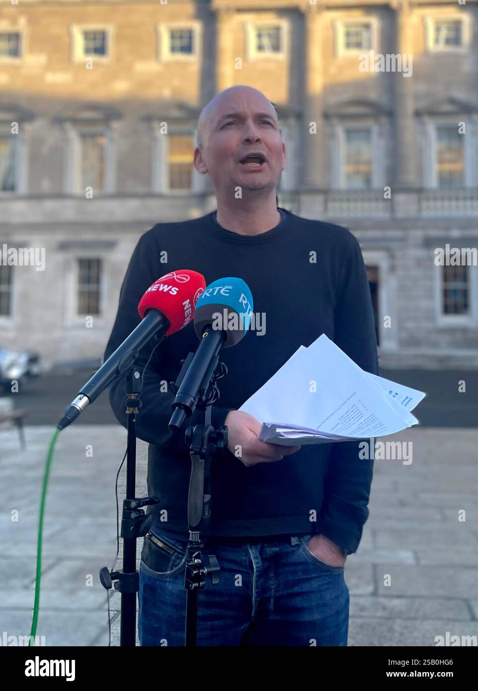 TD Paul Murphy speaking to the media outside Leinster House in Dublin ...