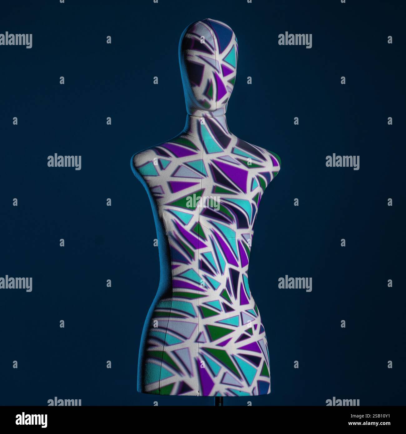 Mannequin illuminated with creative lights with geometric effects Stock Photo